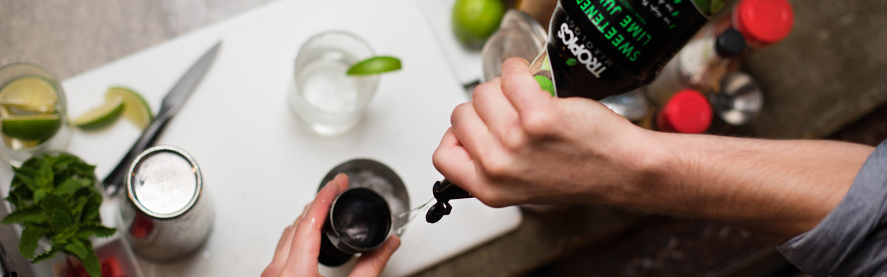 Restaurant-Bar-Channel_Page-Header Restaurant & Bar Channel page header of bartender pouring Tropics mixer